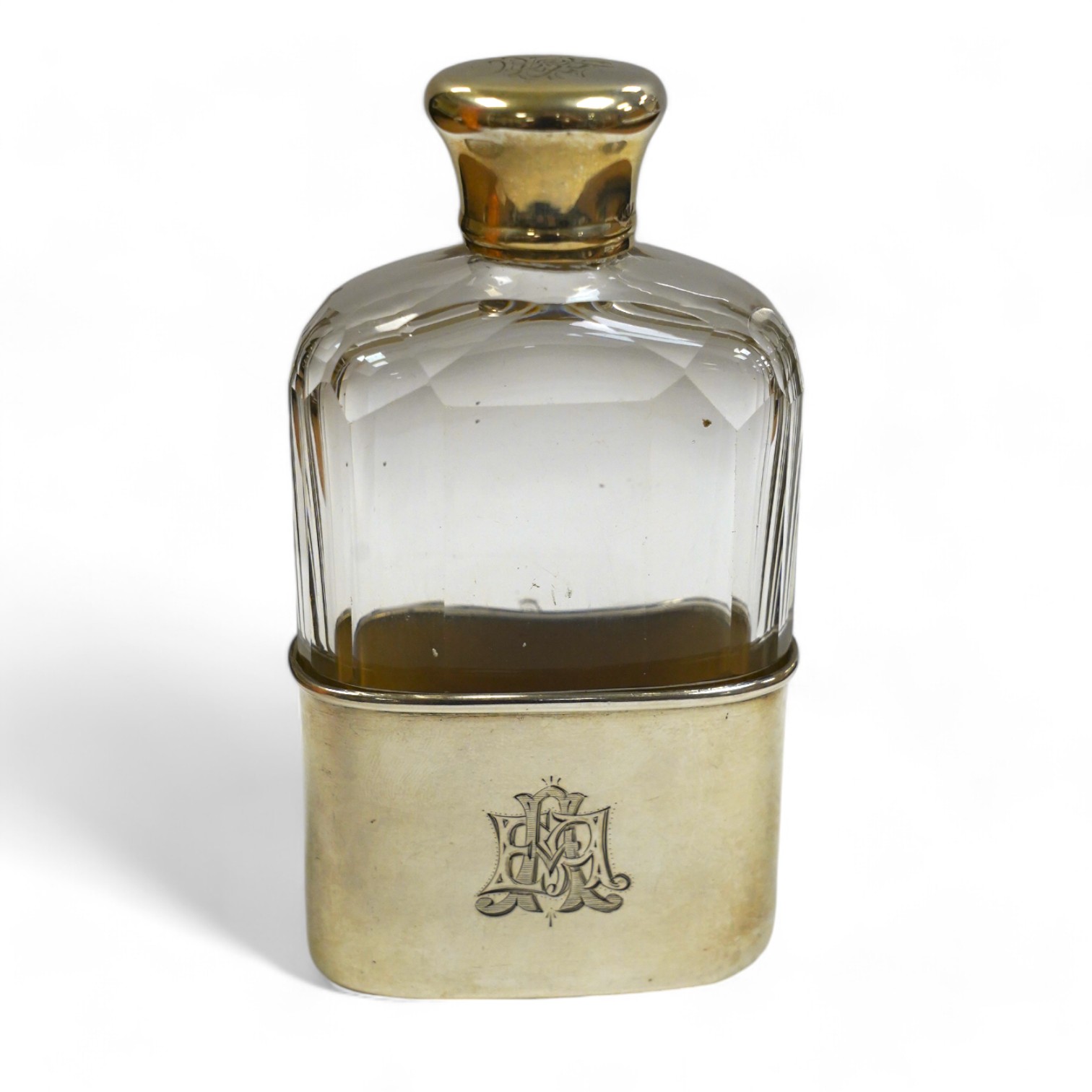 A Victorian silver mounted cut glass spirit flask, with engraved monograms, by Thomas Johnson II, London, 1876, 12cm. Condition - fair to good